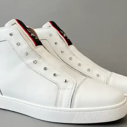 Christian Louboutin de caña alta en negro, zapatilla de firma de mujer